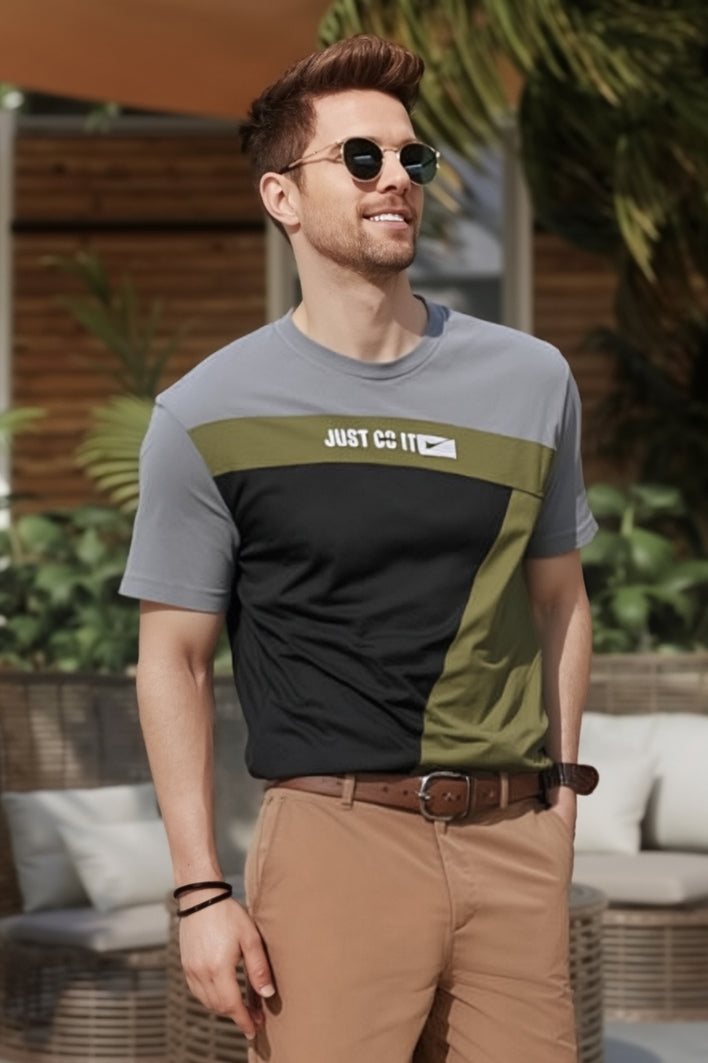 gray, green, and black 'Just Grit' t-shirt